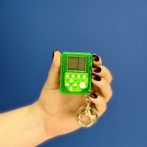 hand held Atari key chain green